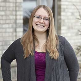 Female dental team member smiling in a dental office staff photo